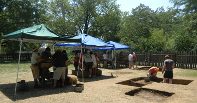 Screening under the tents at Tidewater Archaeology Weekend.