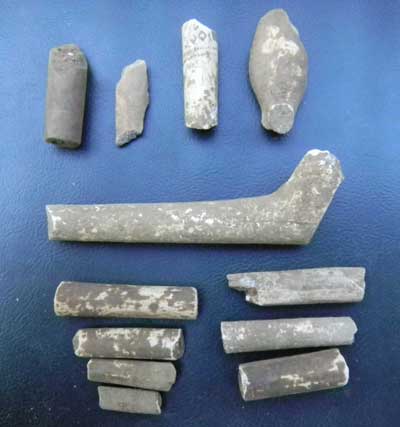 A selection of pipe fragments found one morning during excavation of a portion of the midden.