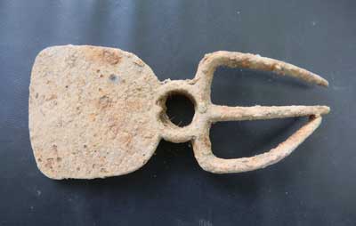 Nineteenth-Century hoe-rake found at the surface of plow zone.