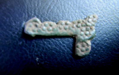 Part of the frame of a 17th-century buckle.