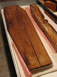 Red cedar wood coffin lid after treatment. Numerous species of wood were used for different parts of the coffins. All of the recovered wood is stored in a special cabinet in the HSMC laboratory.
