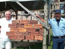 Jimmy and J. with signed bricks.