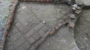 Section of brick paving that led to the Brome House uncovered during week 2 excavations